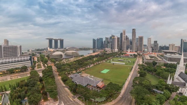Singapore business district city skyline high angle view night to day timelapse, Marina Bay, Singapore 4K Time lapse