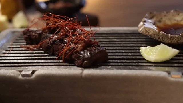 Whale meat steak medium rare, traditional food of islander