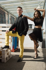 Obraz premium loving couple walking on city street