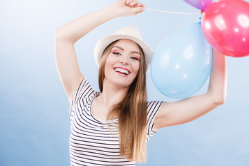 Woman summer joyful girl with colorful balloons