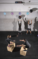 Crossfit group training together at gym