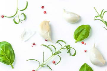 Pattern of italian spices and herbs top view flat lay. Garlic, red pepper, rosemary and basil