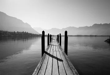 Zelfklevend Fotobehang zwart-witte houten brug © Ivan