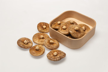 dry fig in the wooden box isolated