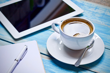 Coffee cup hot and smartphone notebook pen