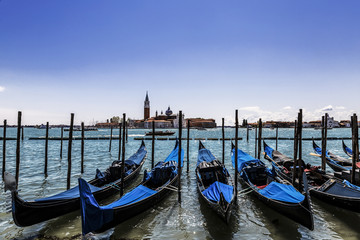 A view of the Cathedral of San Giorgio Maggiore, Venice lagoon and gondolas from the Piazza San Marco, Venice, Italy