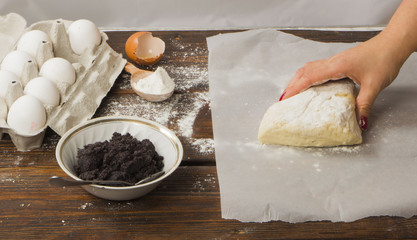 dough with close-up. man is preparing bread dough