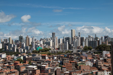 Fototapeta na wymiar Social Contrast - Favela and buildings