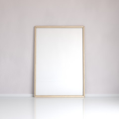 Realistic wooden blank picture frame near the wall, 3D rendering