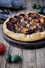 Galetta. Open fruit cake with a feijoa, persimmon, plum