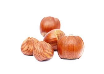 Group fresh hazelnuts isolated on white background