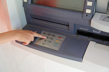 hand type the secret code in the ATMs keyboard to pick up the mo
