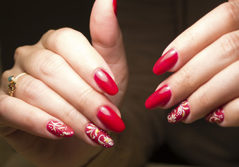 pedicure red in composition with autumn leaves