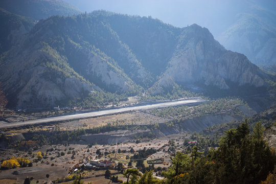 Airport ranway in the Himalaya range, Annapurna region, Nepal