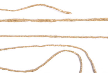 Strings isolated on white background texture, top view
