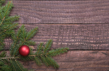 Christmas decoration tree with ball on wooden background