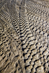 Agios Kosmas bay, Athens, Greece, September 20 2017: Track of truck wheels on sand after coastal cleanup that followed the extensive sea pollution from the sinking of an oil tanker in Saronic Gulf.