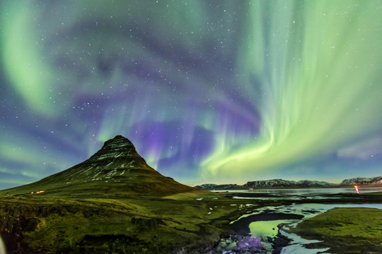 Northern Light Aurora borealis at Kirkjufell Iceland with fully start in the sky