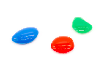 Photos of water droplets of various colors, including red, blue, and green, were dropped on a white background.