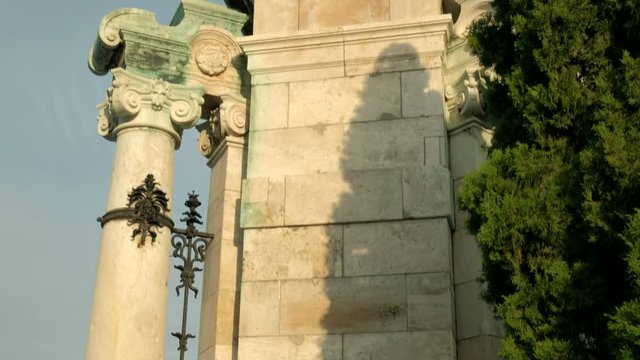 Camera rises to reveal rear or Turul statue in Buda Castle Budapest