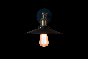 Vintage style wall lamp isolated on black  background.