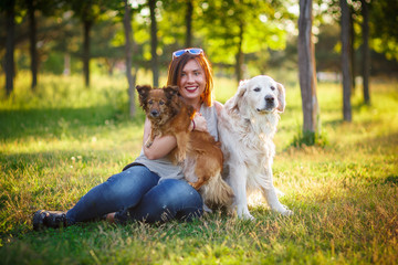 Girl with dogs in the park
