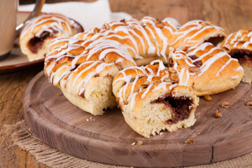 Cinnamon Pecan Danish on a Wooden Platter