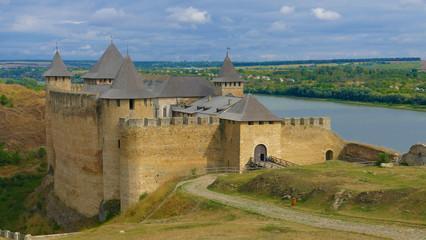 Khotyn castle in Ukraine is a powerful medieval fortress that witnessed the fighting between Poles, Cossacks and Turks. High medieval walls, towers on the background of the picturesque Dniester.