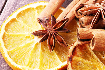 Dry slices of orange, cinnamon, cloves and cardamom.