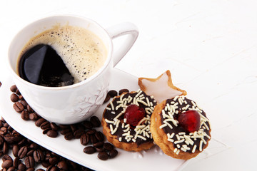 Coffee and Homemade cookies with sugar. Handmade Christmas cookies.