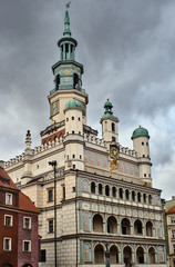 town hall with clock tower in the Old Market Square in Poznan.