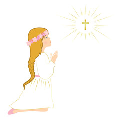 My first communion. Cute girl with long hair praying on knees.