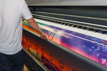 Large-format printing machine in the printing house. Industry - obrazy, fototapety, plakaty