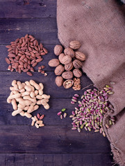 Dried fruits on the table and jute canvas