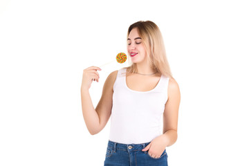 Young cute girl with lollipop, isolated  