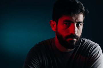 Dramatic portrait of bearded man. Concept of sadness, depression, alert