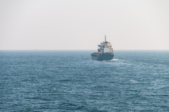 Cargo ship sailing in the sea