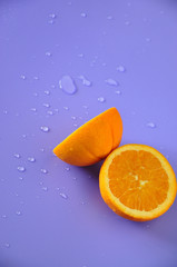 Fototapeta na wymiar Half of Navel Orange with Water Drop