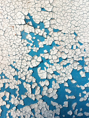 Peeling (crack) white and blue paint on the wall