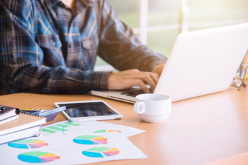 Businessman using laptop computer.