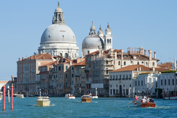 Fototapeta na wymiar Dome of the Cathedral of Santa Maria della Salute above the Grand Canal. Venice, Italy