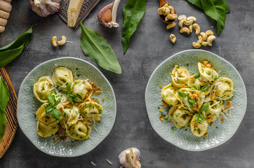 Stuffed Tortellini garlic and spinach - obrazy, fototapety, plakaty