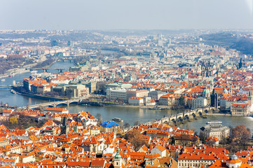 Fototapeta na wymiar Prague scenic panoramic aerial view of the cityscape with Vltava river and Charles bridge, Czech Republic