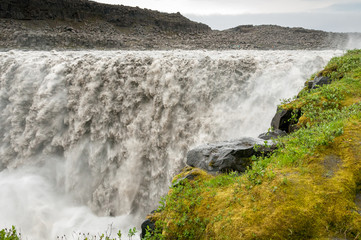 The Dettifoss waterfall, considered the most powerful in Europe, pours tons of muddy water into northern Islance