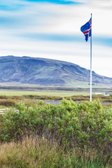 icelandic flag near Kerid Lake in september