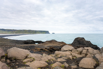 Fototapeta na wymiar Atlantic ocean coast and black beach in Iceland