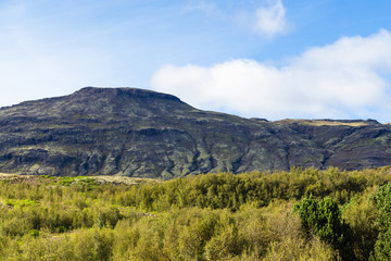 Fototapeta na wymiar mountains around Haukadalur geyser area in Iceland