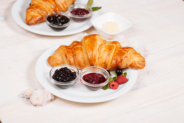 Home made jams with fresh croissants