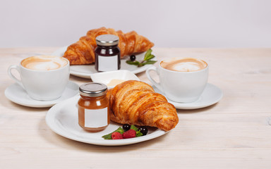 Close up of fresh croissants and jam