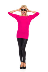 Fototapeta premium Beautiful Woman Is Holding Head In Hands And Shouting